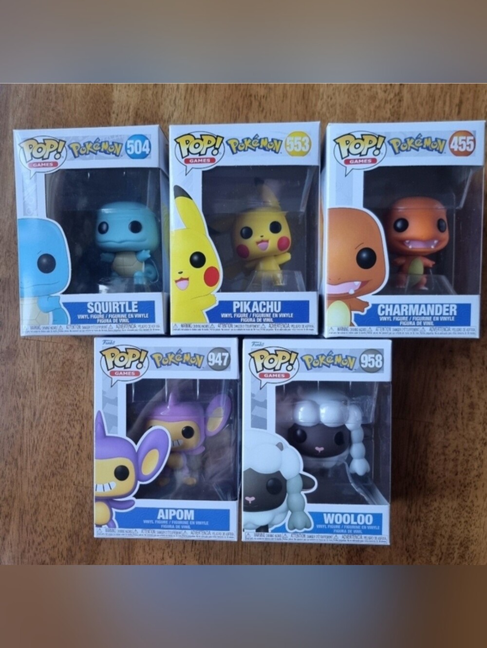 Funko Pop! Pokémon Lot Of 5  — Squirtle, Pikachu, Charmander, Aipom, Wooloo